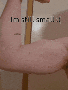 a man 's arm is shown with the words i 'm still small below it
