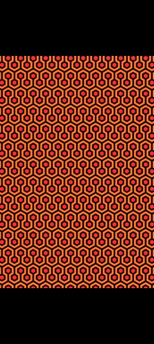 a pattern of red and orange hexagons on a black background