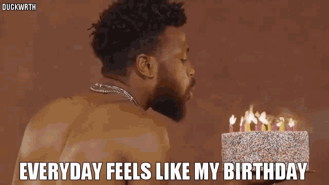a man without a shirt is blowing out candles on a birthday cake with the caption everyday feels like my birthday