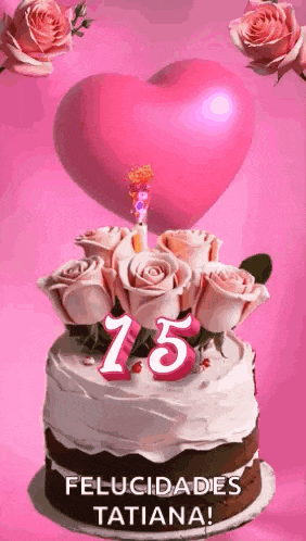 a birthday cake with roses and a heart on top and the number 15 on it