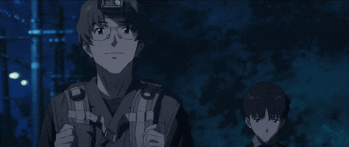 a man with glasses and a backpack stands next to a boy with short hair