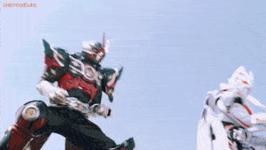 a man in a robot costume is fighting another man in a white costume