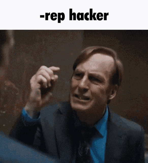 a man in a suit and tie is making a funny face with the words -rep hacker behind him