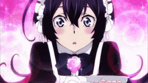 a girl in a maid costume is holding a lollipop .