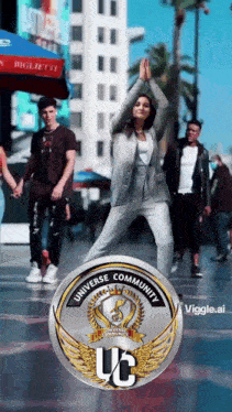 a woman is dancing in front of a badge that says universe community