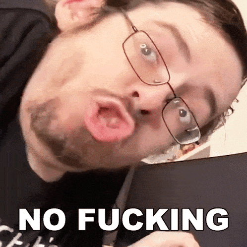 a man wearing glasses is making a funny face with the words no fucking written above him