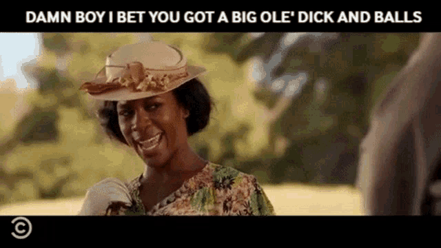 a woman wearing a hat and a floral dress says " damn boy i bet you got a big ole dick and balls "