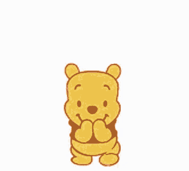 winnie the pooh is wearing a red shirt and holding a pink heart over his head .