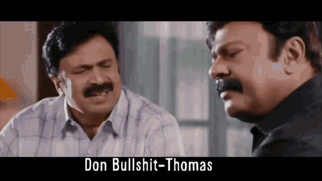two men are sitting next to each other and one of them says don bullshit-thomas