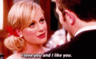 a man and a woman are looking at each other and the woman is saying i love you and i like you .