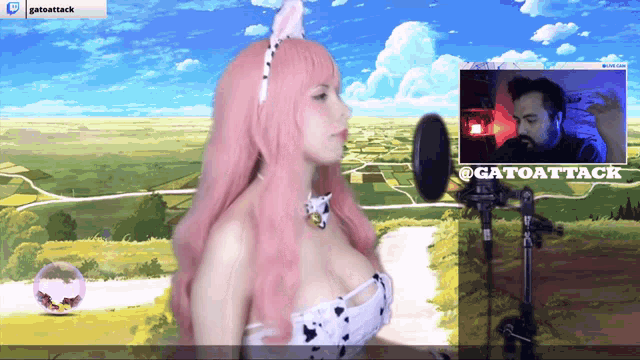a woman with pink hair stands in front of a microphone and a screen that says gatoattack on it