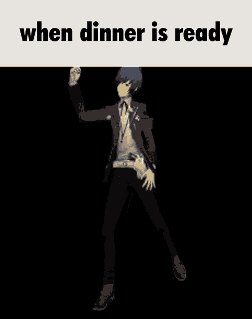 a man in a suit and tie is dancing in front of a black background .