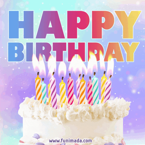 a birthday cake with candles lit up and the words happy birthday above it