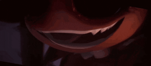 a close up of a person 's mouth with their tongue hanging out