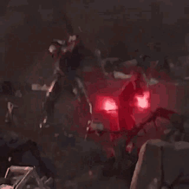 a red light is shining in a dark room