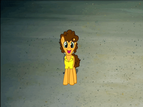 a cartoon pony is standing on a sandy beach