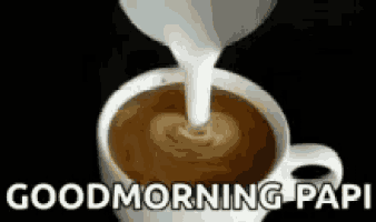 a cup of coffee with milk being poured into it with the words `` good morning papi '' .