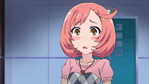a girl with pink hair and brown eyes is standing in front of a green door