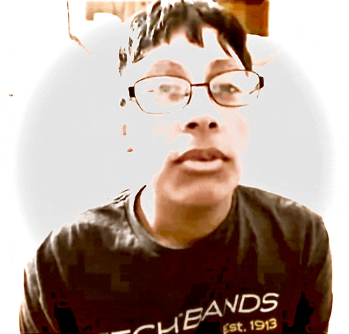 a man wearing glasses and a shirt that says tech bands on it