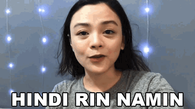 a woman with the words hindi rin namin written on her face
