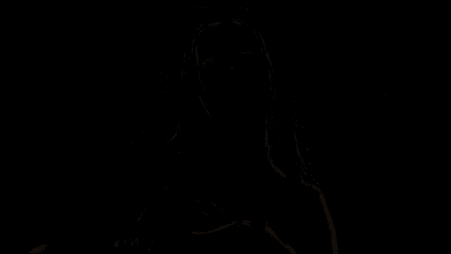a movie clip of a woman with a snake around her waist