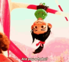 a cartoon character is hanging upside down with a cupcake on her head and says are you a hobo ?