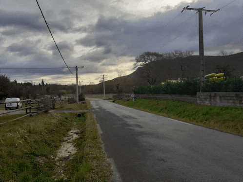 a road with a sign that says ' a ' on it in the middle