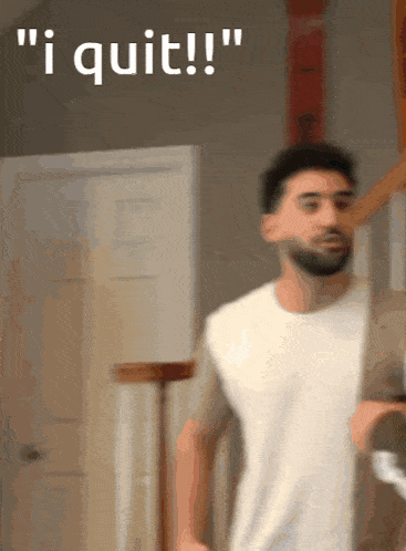 a man walking down stairs with the words " i quit " written above him