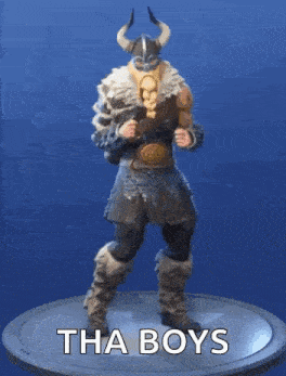 a statue of a viking dancing with the words tha boys below him