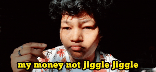a man says " my money not jiggle jiggle " in front of a dollar bill