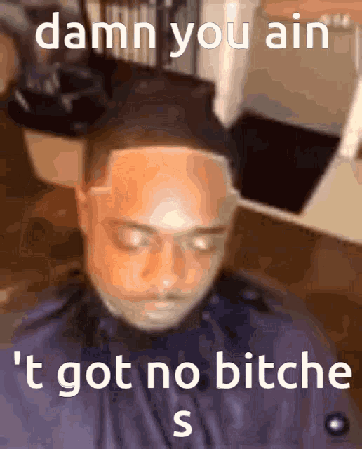 a picture of a man getting his hair cut with the caption " damn you ain t got no bitch "