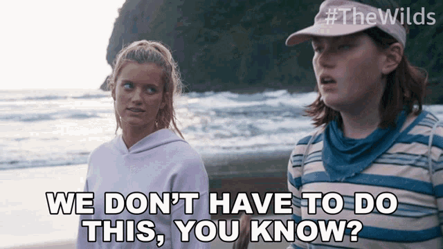 two girls standing on a beach with a caption that says we don t have to do this you know