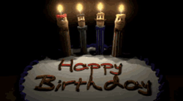 a birthday cake with four lit candles and the words happy birthday on it