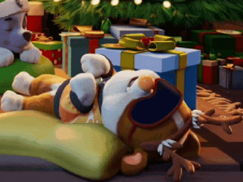 a cartoon dog is laying on a pillow in front of a christmas tree with presents .