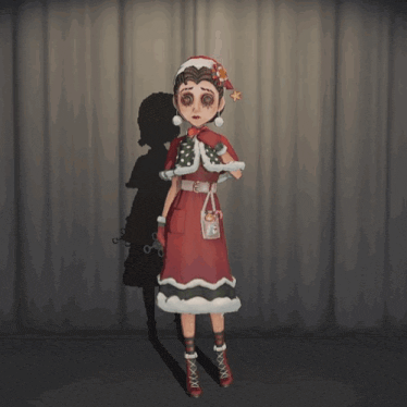 a girl in a santa hat is holding a christmas tree