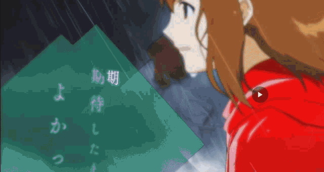 a girl in a red jacket is looking at a green piece of paper with chinese writing on it