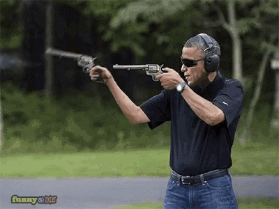 a man wearing headphones is pointing a gun at the camera with funny or die written on the bottom