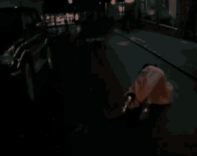 a woman in a pink dress crawls on the ground