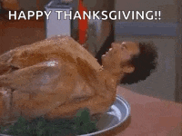 a naked man is laying on a plate of food with the words `` happy thanksgiving !! hey , buddy . ''
