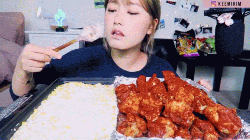 Eating Spicy Wings GIF - Eating Spicy Wings Cheese Fondue GIFs