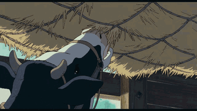 a cartoon drawing of a cow with horns and a bridle standing under a thatched roof