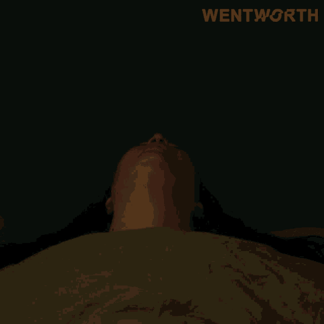 a picture of a woman laying down with the word wentworth on the top