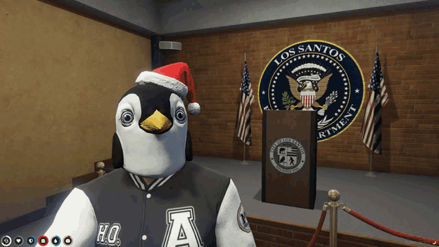 a penguin wearing a santa hat stands in front of a los santos department seal