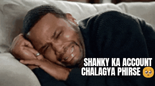 a man is crying on a couch with the words shanky ka account