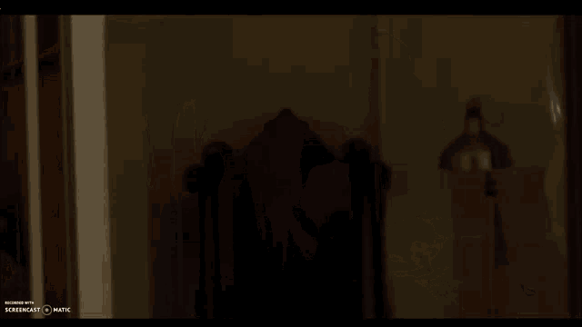 a screen shot of a person laying on a bed with the words screencast on the bottom