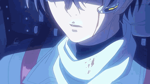a close up of a person 's face with a few spots of blood on it