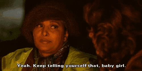 a woman in a yellow jacket is talking to another woman and says " yeah keep telling yourself that baby girl "