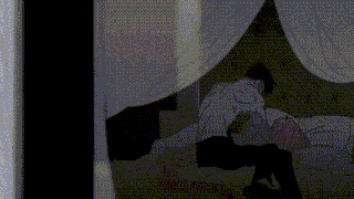 a black and white drawing of a couple laying on a bed