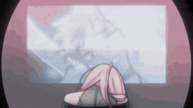 a girl with pink hair is looking at a drawing