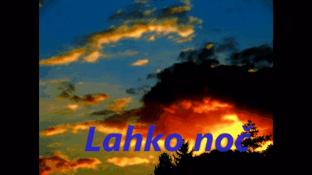 a picture of a sunset with the words " lahko noc " in blue